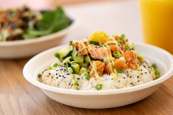 Sukoshi Sake to Me with Scottish salmon, truffle chive, avocado cream, tobiko, wonton crunch, ponzu, cucumber, and volcano salt. Photo credit- Mia Yakel.