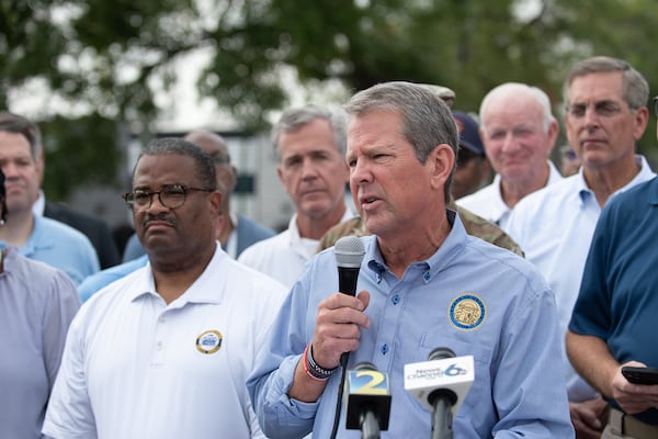 While in Augusta earlier this week, Gov. Brian Kemp (right) gave an update on storm cleanup. 