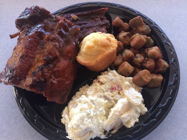 This two-meat combo plate at Sam’s BBQ-1 in east Cobb includes baby back ribs and brisket, plus fried okra, potato salad and a corn muffin. CONTRIBUTED BY WENDELL BROCK