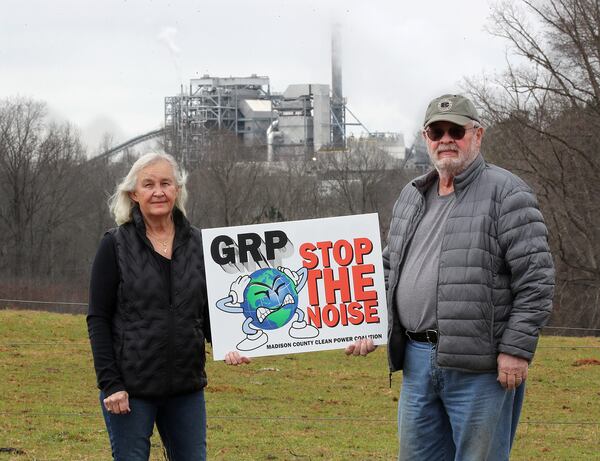 020921 Colbert: Cheryl and Mack Adams hold their clean power coalition stop the noise sign outside their home just a mile away from the Madison Biomass Power Plant on Tuesday, Feb 9, 2021, in Colbert. The Adams oppose the noise and air quality coming from the facility.     Curtis Compton / Curtis.Compton@ajc.com”