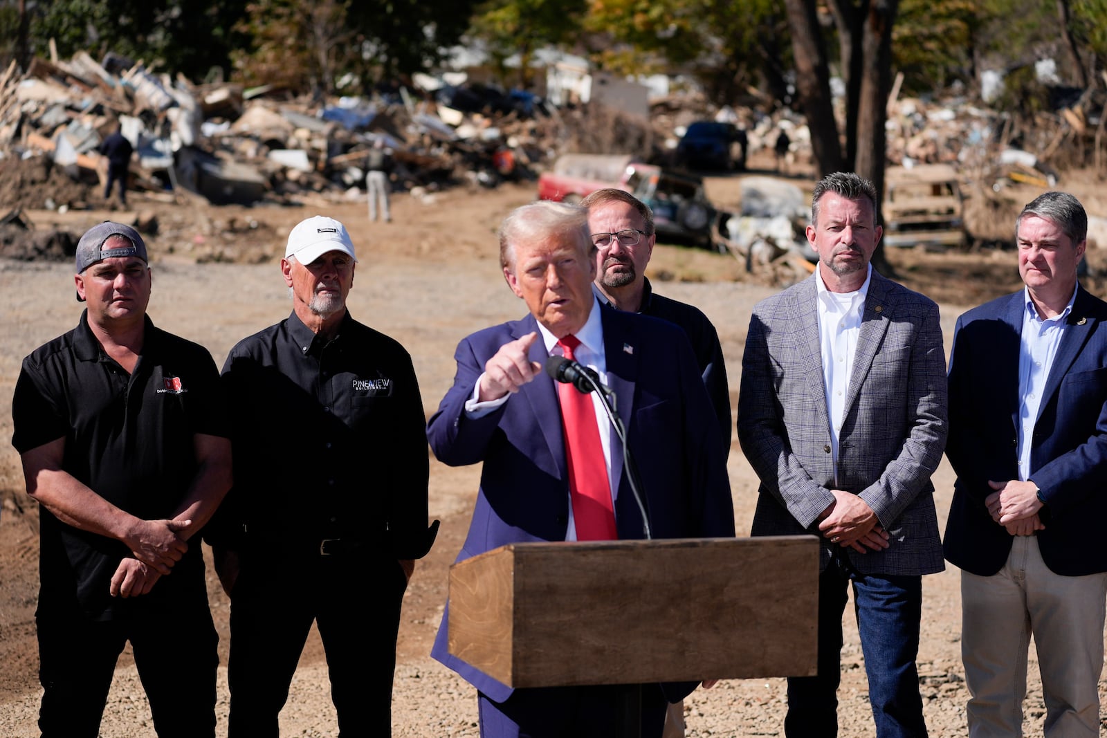 Republican presidential nominee former President Donald Trump delivers remarks on the damage and federal response to Hurricane Helene, Monday, Oct. 21, 2024, in Swannanoa, N.C. (AP Photo/Evan Vucci)