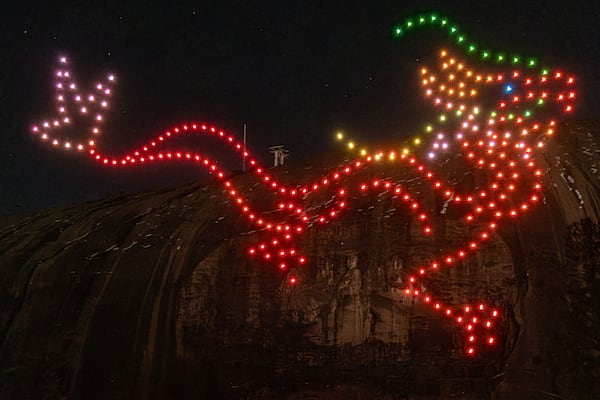 Drones form a dragon during the drone and light show to end the day’s festivities at the Lunar New Year Festival at Stone Mountain Park on Saturday, Jan. 25, 2025.   Ben Gray for the AJC