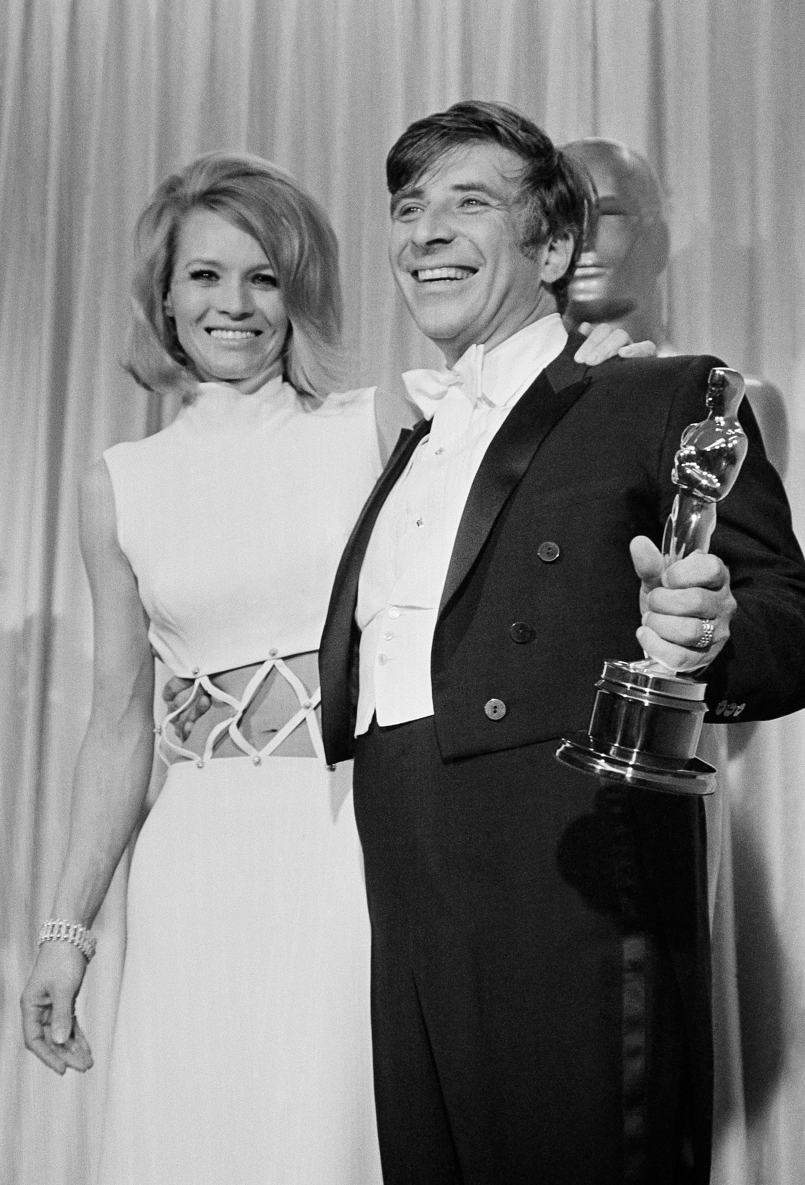 Elmer Bernstein (right) and presenter Angie Dickinson pose after he won an Oscar for best original music score for "Thoroughly Modern Millie" in Santa Monica, Calif., on April 10, 1968. Bernstein, who composed the "Ghostbusters" score, died in 2004 at age 82. (AP)