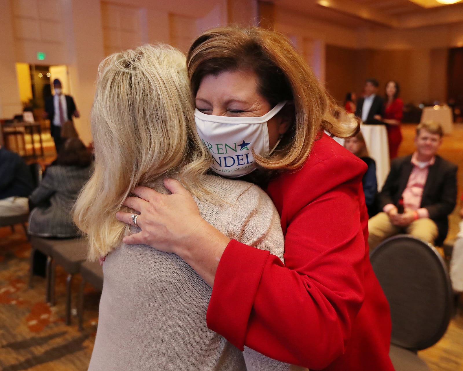 110320 Atlanta: Karen Handel, 6th congressional district candidate, hugs supporter Linda Schutter at the Georgia Republican Party Election Night Celebration in the Intercontinental Buckhead Atlanta hotel on Tuesday, Nov 3, 2020 in Atlanta.   “Curtis Compton / Curtis.Compton@ajc.com”