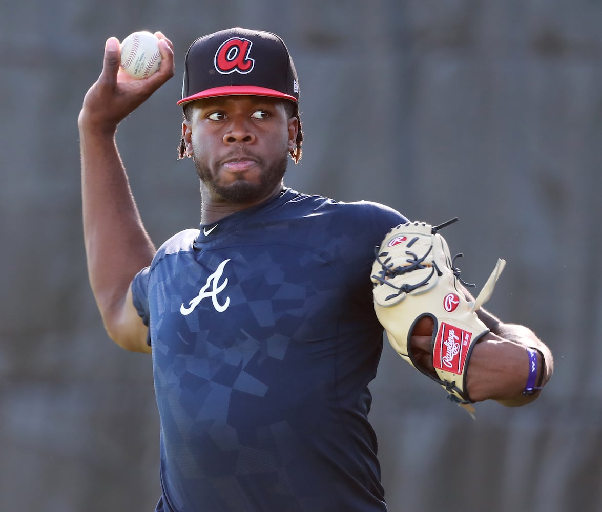 Photos: Pitchers and catchers report to Braves spring training