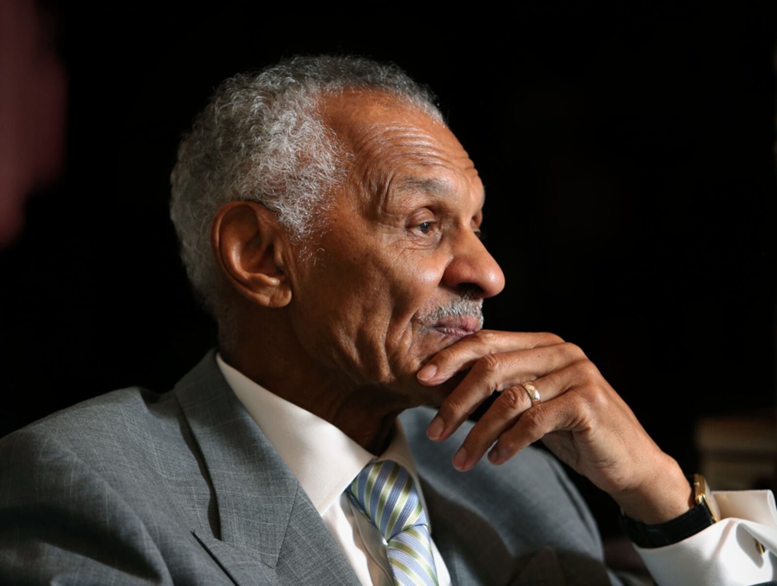 October 1, 2013 - Atlanta, Ga: Rev. C.T. Vivian reacts as he talks with an AJC reporter at his home Tuesday afternoon in Atlanta, Ga., October 1, 2013. Vivian is a minister, author, and was a close friend and lieutenant of Reverend Martin Luther King, Jr. during the American Civil Rights Movement. Getz said, "This was part of a Personal Journey story on Vivian. Most of the time when a subject is talking to the reporter it doesn't make a photograph. But because of the subject and the way I put a light on Vivian, I was able to capture a dramatic image of Vivian during a thoughtful moment." JASON GETZ / JGETZ@AJC.COM