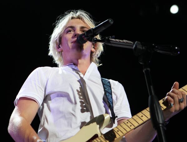 July 10, 2015 Atlanta: Ross Lynch sings and plays guitar. R5, a five-piece band made up of four siblings and a family friend, performed at Verizon Wireless Amphitheater in Alpharetta on Friday night. Ross Lynch, vocalist, guitarist and frontman, stars on the Disney Channel show Austin & Ally. Jacob Whitesides and Ryland opened for the headliner. HAYDEN FIELD / HAYDEN.FIELD@AJC.COM