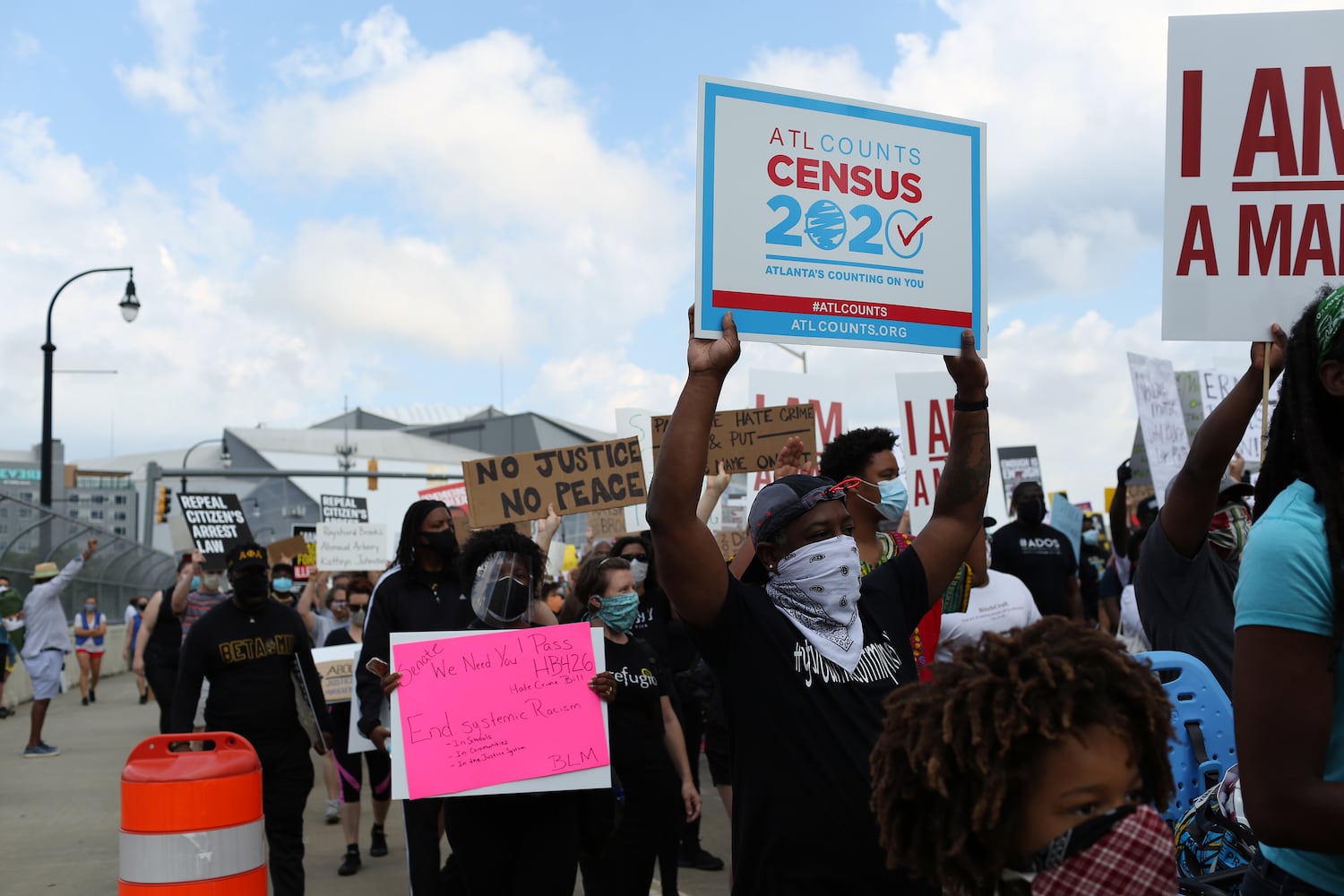 PHOTOS: Thousands march at Georgia Capitol as lawmakers return