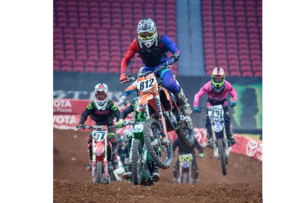 Alex Rice clears a jump ahead of the pack during the Supercross Amateur racing event at the Mercedes-Benz Stadium on Sunday, March 4, 2018. STEVE SCHAEFER / SPECIAL TO THE AJC