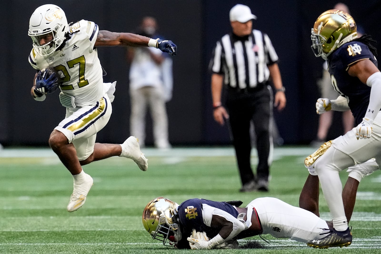 Georgia Tech running back Chad Alexander (27) runs against Notre Dame during the first half of an NCAA college football game, Saturday, Oct. 19, 2024, in Atlanta. (AP Photo/Mike Stewart)