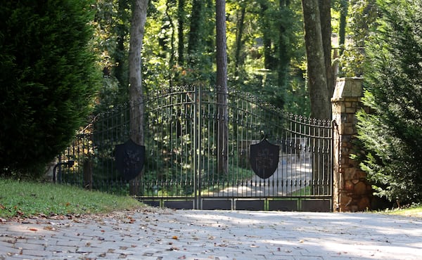 September 4, 2013 - Atlanta, Ga: The front gate of the property of Roy Dixon is shown off of Mount Paran Road Wednesday morning in Atlanta, Ga., September 4, 2013. The owner of the home, Roy Dixon, is involved in a criminal case. JASON GETZ / JGETZ@AJC.COM