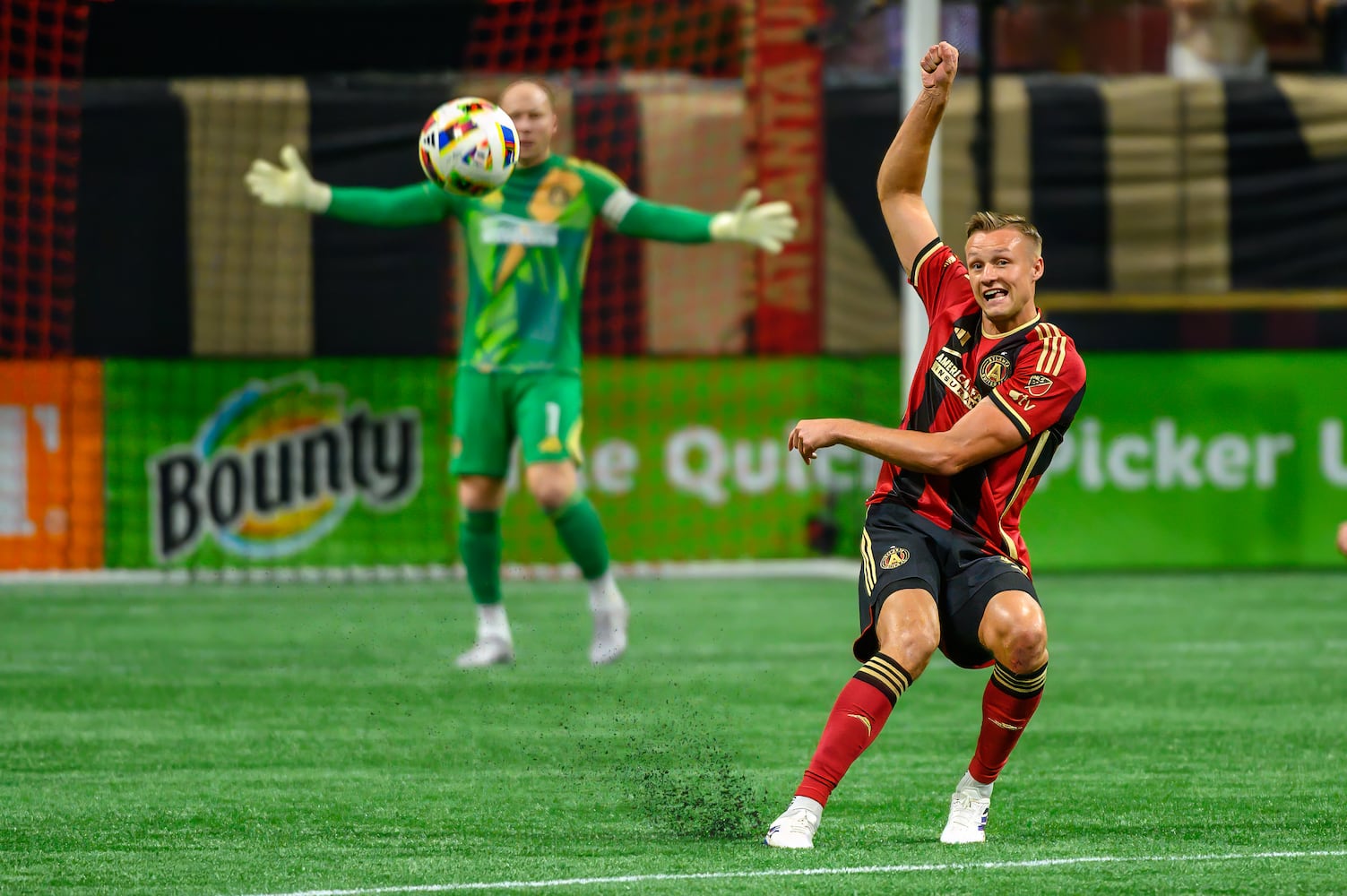 Stian Gregersen kicks the ball during the Atlanta United game against Columbus Crew at Mercedes Benz Stadium in Atlanta, GA on July 20, 2024. (Jamie Spaar for the Atlanta Journal Constitution)