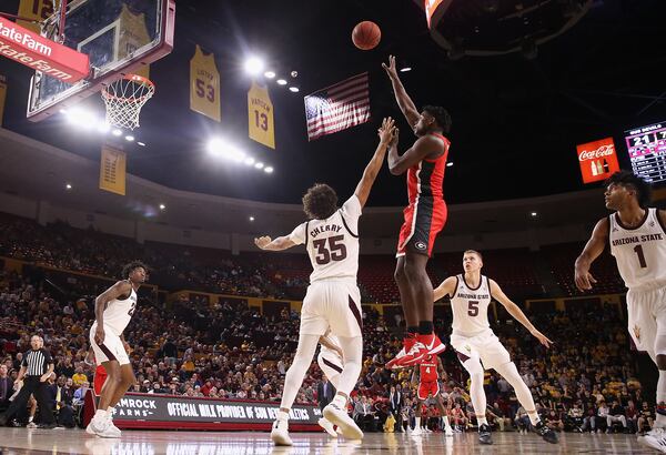 Anthony Edwards #5 of the Georgia Bulldogs attempts a shot over Taeshon Cherry of the Arizona State Sun Devils. (Photo by Christian Petersen/Getty Images)