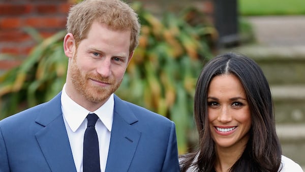 LONDON, ENGLAND - NOVEMBER 27:  Prince Harry and Meghan Markle during an official photocall to announce the engagement of Prince Harry and actress Meghan Markle at The Sunken Gardens at Kensington Palace on November 27, 2017 in London, England.  Prince Harry and Meghan Markle have been a couple officially since November 2016 and are due to marry in Spring 2018.  (Photo by Chris Jackson/Getty Images)