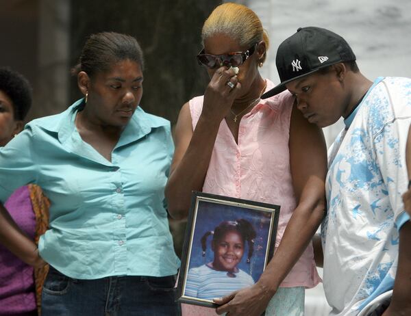 A Feb. 1, 2021 episode of "Atlanta Justice" will feature the 2007 death of nine-year-old Annaijh Rolax. Her mother Antoenette Rolax,  Peggy Wise, Annaijh's grandmother; and Mia Stallion, Annaijh's aunt, at a press conference where they received a check from the Atlanta Police Foundation. The check helped cover funeral costs for Annaijh, who was killed in a drive-by shooting. Ben Gray/Staff