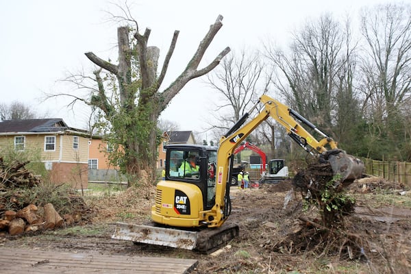 The Environmental Protection Agency has begun excavating and back filling properties on Atlanta’s westside that were found to have dangerous levels of lead in the soil on Jan. 27, 2020, in Atlanta. Residents were not intially told that the remediation would also include the removal and taking down of trees. MIGUEL MARTINEZ / FOR THE AJC