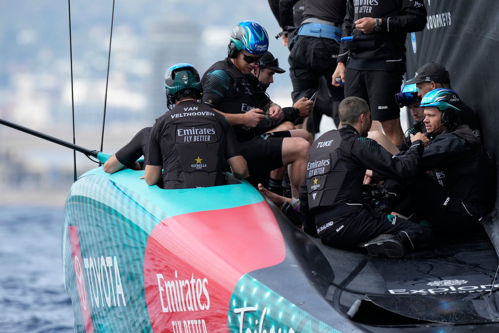 Emirates Team New Zealand crew prepares for the Louis Vuitton 37th America's Cup Day 3 race in Barcelona, Spain, Friday, Oct. 18, 2024. (AP Photo/Bernat Armangue)