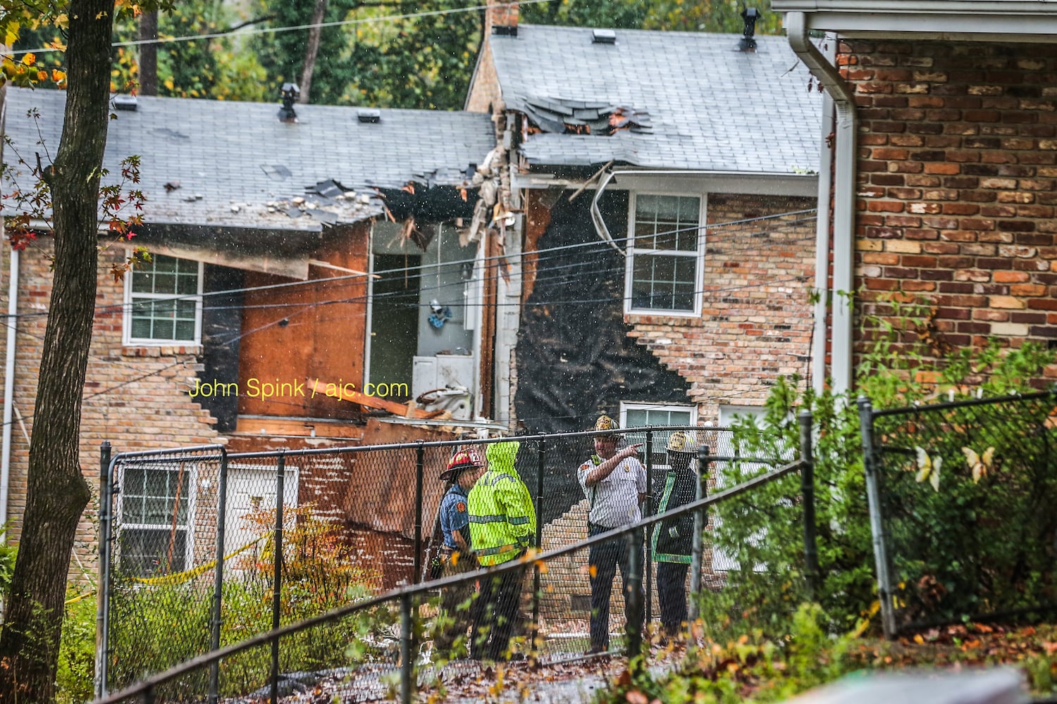 PHOTOS: Plane hits townhome complex in DeKalb County