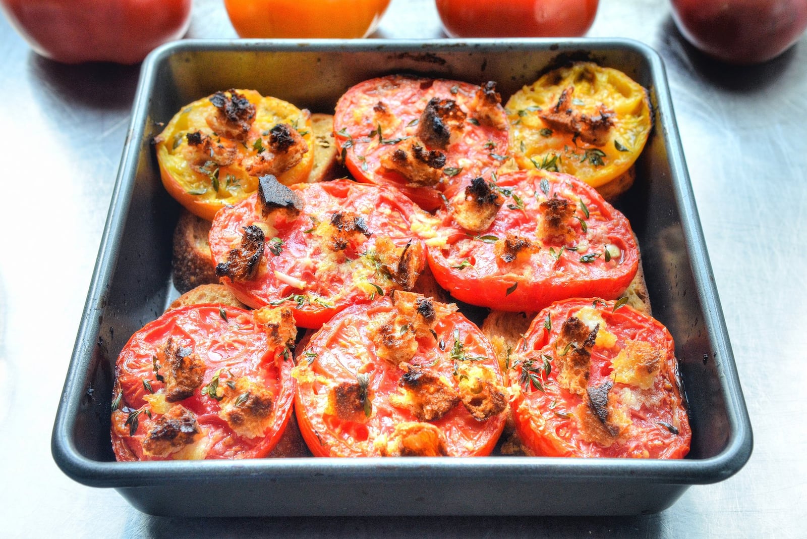 Carla Hall’s Tomato Pie with Garlic Bread Crust: The celebrity chef calls this “pie” her variation of a classic Southern tomato pie. That may be a bit of a stretch: It’s basically tomatoes baked on sliced crusty bread with plenty of garlic, olive oil and thyme. Just be sure to use the best tomatoes you can find, preferably heirloom. STYLING BY WENDELL BROCK / CONTRIBUTED BY CHRIS HUNT PHOTOGRAPHY