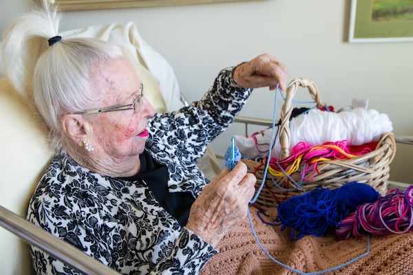 Margrit Ottwiller has crocheted hats throughout the pandemic to give to charity.  PHIL SKINNER FOR THE ATLANTA JOURNAL-CONSTITUTION.