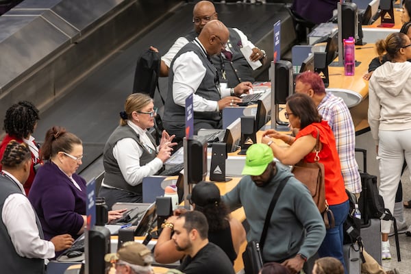 Travelers packed into Atlanta’s Hartsfield-Jackson International Airport on Friday, May 24, 2024, during the busy Memorial Day travel period. (John Spink/AJC 2024)