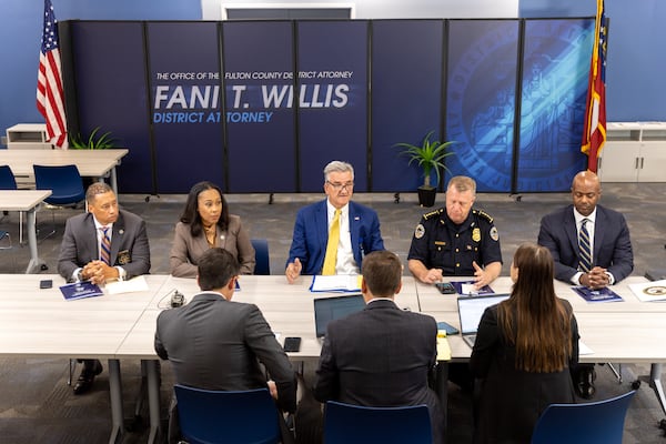 (L-R) Fulton County Sheriff Patrick Labat, District Attorney Fani Willis, Atlanta Police Foundation President Dave Wilkinson, Atlanta Police Chief Darin Schierbaum, and U.S. Attorney Ryan Buchanan appear for a press interview at the district attorney’s office in Atlanta on Friday, July 12, 2024. The public safety officials presented findings from a report on repeat offenders. (Arvin Temkar / AJC)