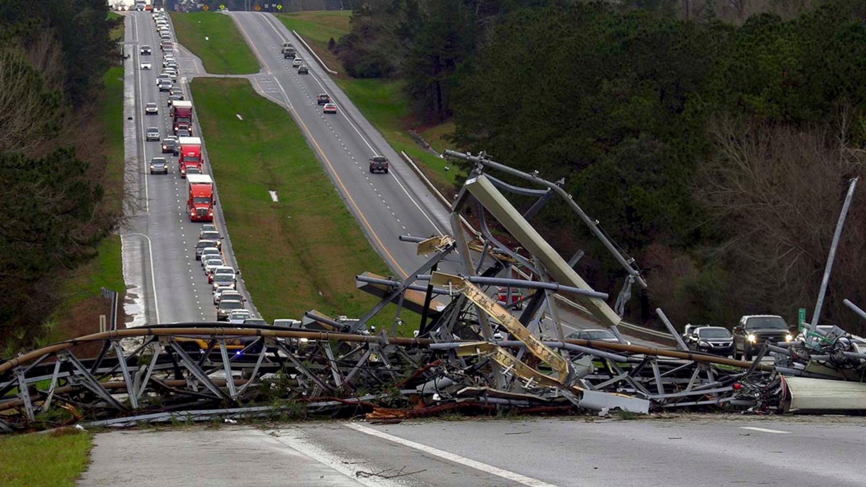 Photos: Possible tornadoes leave path of death, destruction in parts of Southeast