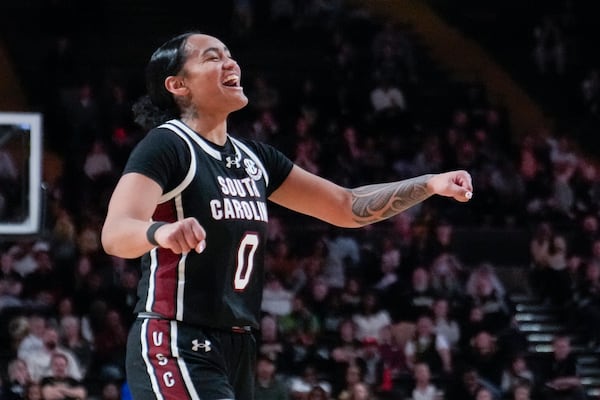 South Carolina guard Te-Hina Paopao (0) celebrates during the second half of an NCAA college basketball game against Vanderbilt, Sunday, Feb. 23, 2025, in Nashville, Tenn. (AP Photo/George Walker IV)