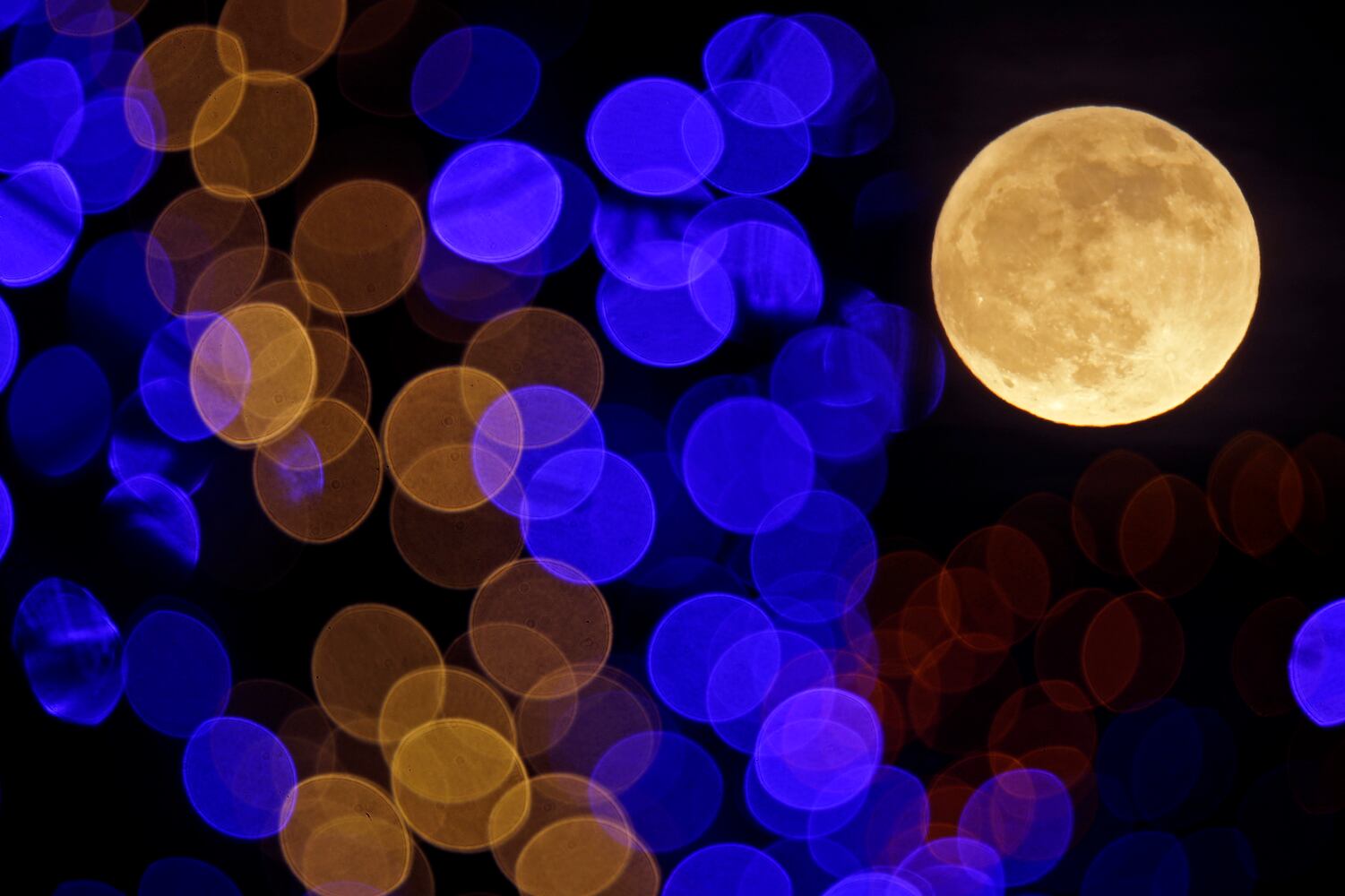 Photos: December full moon, the last of the decade, lights up the night sky