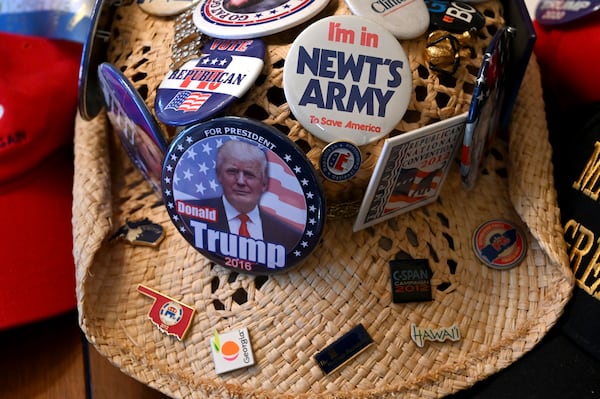 Judy Griffin's straw cowboy hat is decorated with Republican pins she has collected over the years. (Hyosub Shin/AJC)