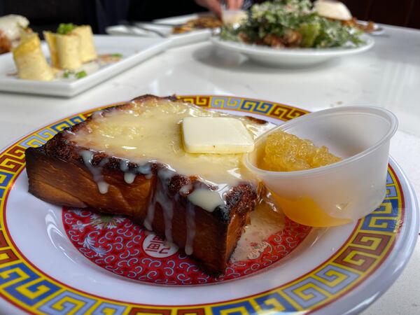 Mighty Hans' rich custard toast includes pineapple. Ligaya Figueras/ligaya.figueras@ajc.com