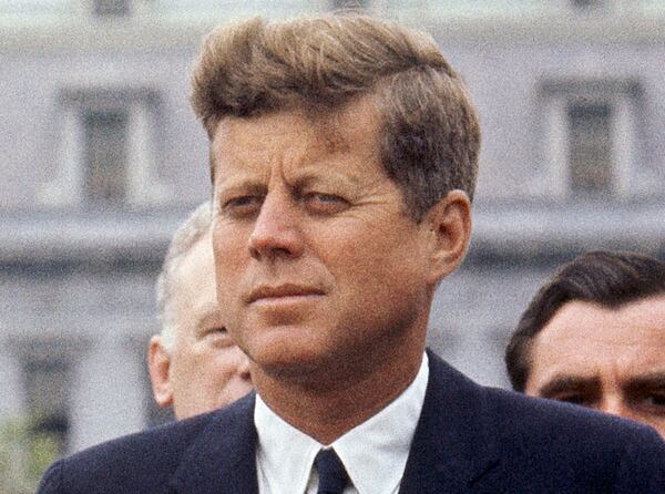 FILE - President John F. Kennedy listens while Grand Duchess Charlotte of Luxembourg speaks outside the White House, April 30, 1963, in Washington. (AP Photo/William J. Smith, File)