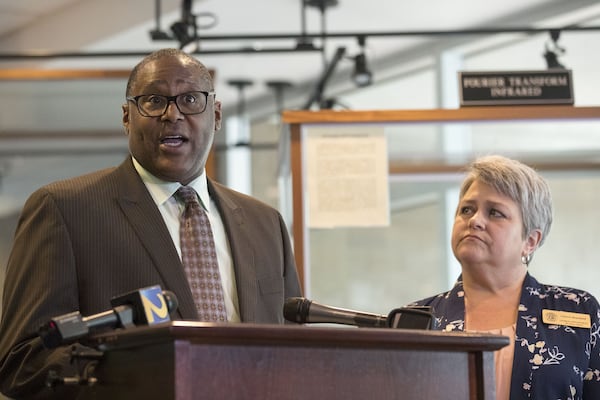 07/18/2018 — Atlanta, Georgia — Walker Tisdale (left), Director of Suicide Prevention at Georgia Department of Behavioral Health and Developmental Disabilities, speaks during a press conference held at the GBI headquarters in Decatur, Wednesday July 18, 2018. The press conference was held to introduce a public service announcement aimed at advising parents on how they can work to help prevent youth suicides in Georgia. (ALYSSA POINTER/ALYSSA.POINTER@AJC.COM)