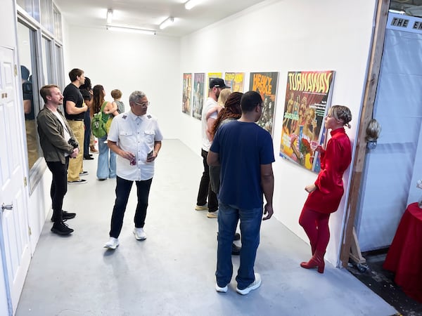 Hail Holtzclaw (right) attends the opening reception for her exhibition "Gloss" at The End Project Space. Courtesy of The End Project Space