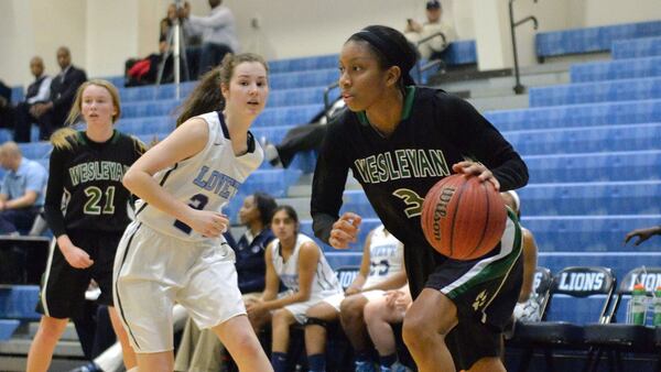 Former Wesleyan star Mikayla Coombs (3) signed with UConn but transferred to Georgia this season. She had to sit out a year.  HYOSUB SHIN / HSHIN@AJC.COM