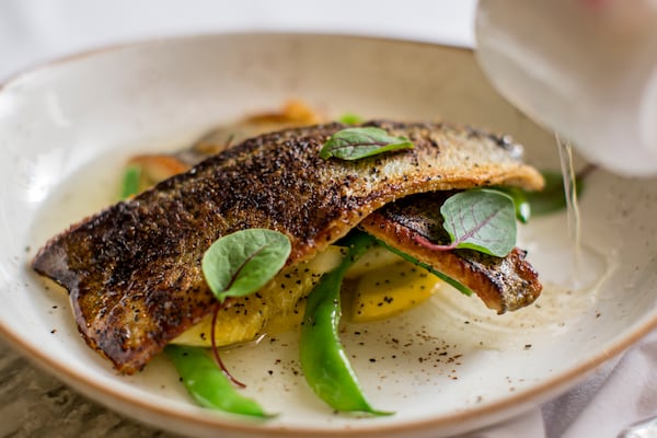 Enchanted Springs Trout with pole beans, summer squash and blistered tomatoes. / Photo contributed by The Ritz-Carlton, Atlanta.