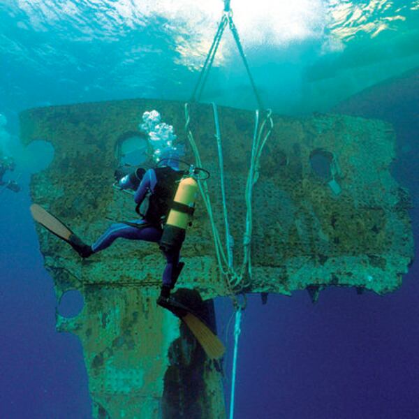 This 1998 image shows a 17-ton portion of the hull of the RMS Titanic as it is lifted to the surface during an expedition to the site of the tradegy.