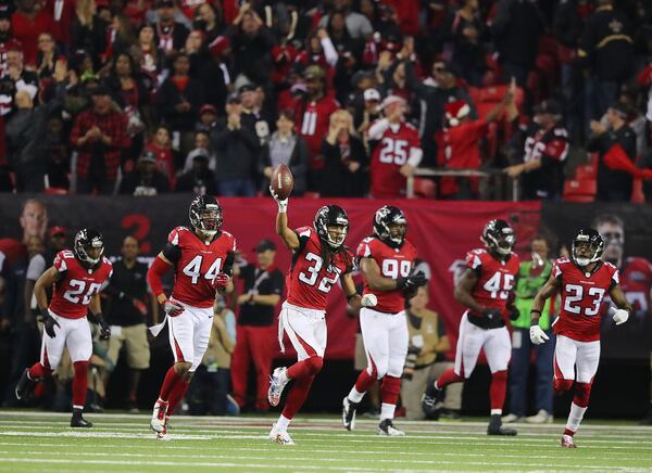 Falcons cornerback Jalen Collins intercepts Saints quarterback Drew Brees in the endzone for a touchback during the fourth quarter in their Jan. 1, 2017, game in Atlanta. The Falcons will face the Seahawks in an NFC Divisional Playoff game on Jan. 14. CURTIS COMPTON / CCOMPTON@AJC.COM