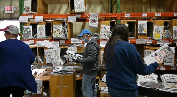 March 26, 2020 Marietta - Employees are busy working to fulfill orders at their warehouse at Glory Haus in Marietta on Thursday, March 26, 2020. Glory Haus, a Cobb County-based home decor business, suffered a massive slump in order cancellations from companies that sell their products due to the novel coronavirus. The business on Monday was featured on Good Morning America’s Deals & Steals from small businesses segments. Since then, the business has seen a sudden, drastic turnaround. Since Monday’s segment, it has received 10,000 orders for its products. (Hyosub Shin / Hyosub.Shin@ajc.com)