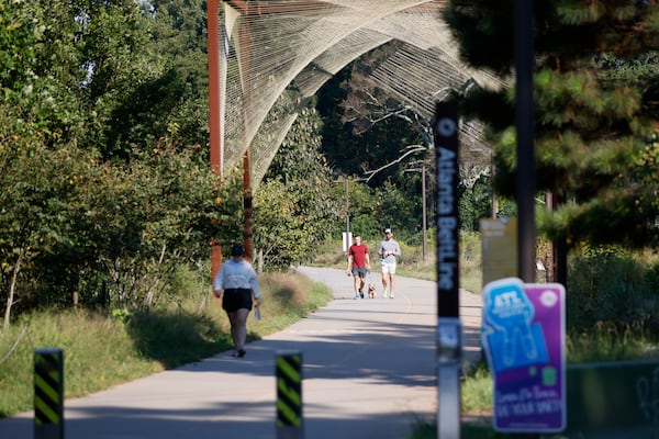 People exercise on the beltline by the Westside trail on Thursday, September 22, 2022. Atlanta City Council voted Monday to temporarily exempt the Beltline and other public infrastructure projects from parts of the city’s own rules for removing and replacing trees. (Miguel Martinez / AJC) 