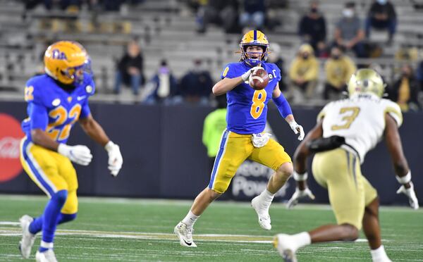 Pitt quarterback Kenny Pickett (8) prepares to pass during the first half of a college football game at Georgia Tech's Bobby Dodd Stadium. (Hyosub Shin / Hyosub.Shin@ajc.com)