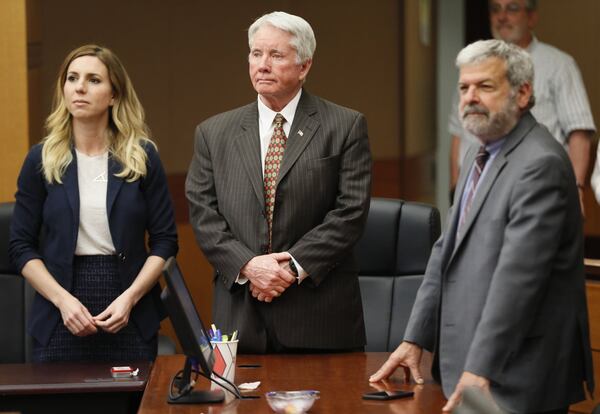 Tex McIver stands with attorneys Amanda Clark Palmer (left) and Don Samuel on Friday, April 20, 2018, in the Tex McIver murder trial at the Fulton County Courthouse. 