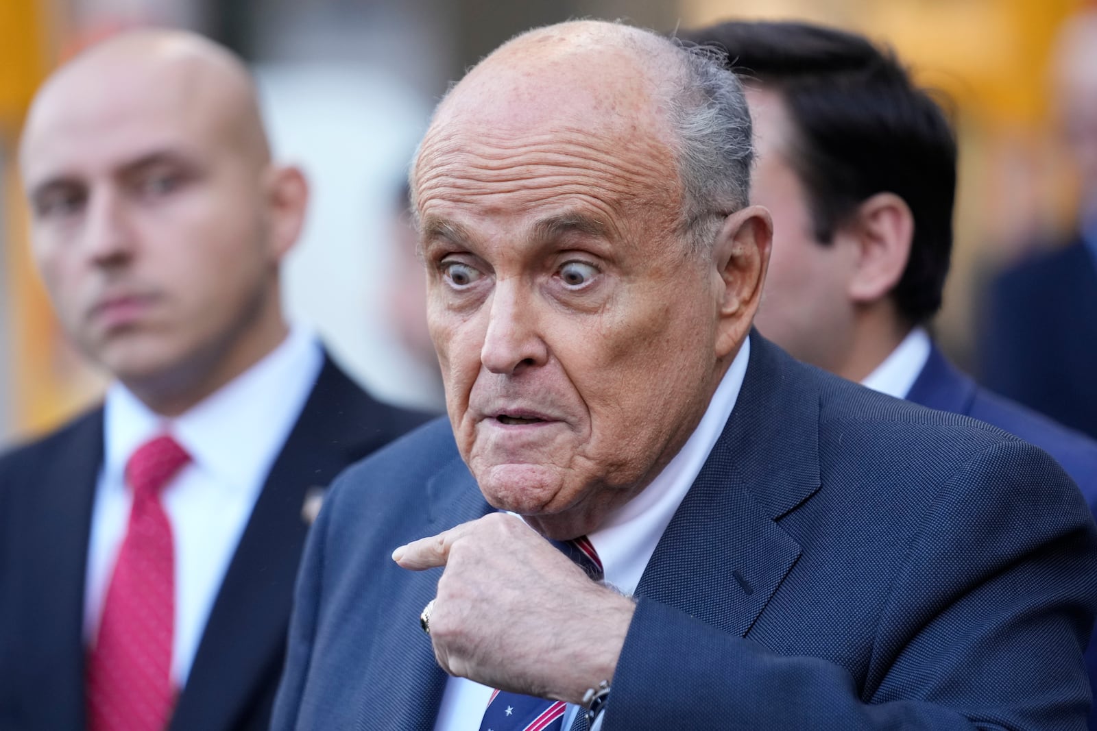 Former New York Mayor Rudy Giuliani speaks to the media as he leaves court in New York, Thursday, Nov. 7, 2024. (AP Photo/Seth Wenig)