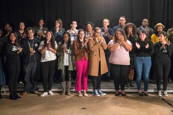 Abrams staffers applaud after she ended her campaign. (ALYSSA POINTER/ALYSSA.POINTER@AJC.COM)