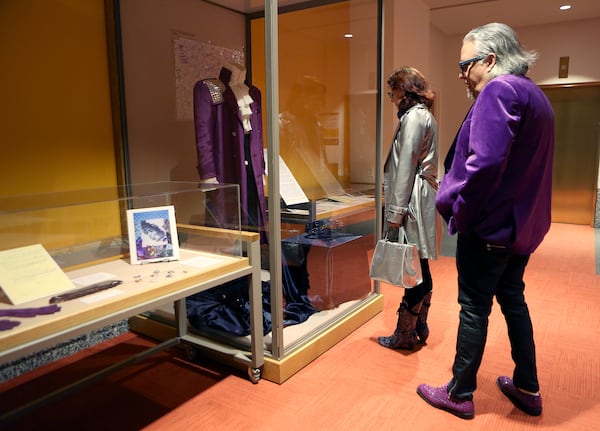  St. Paul residents Jason and Rachel Gorski take a look at a small Prince exhibit at the Minnesota History Center. Photo: RYON HORNE / RHORNE@AJC.COM