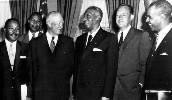 (WX5) Washington, DC - June 23, 1958 - President Eisenhower poses in this office today with Negro leaders with whom he discussed civil rights issues. Left to right: Dr. Martin Luther King Jr., of Montgomery,Ala., president of the Southern Leadership Conference; E. Frederic Morrow, White House administrative officer; Eisenhower; A. Philip Randloph, AFL-CIO vice president and head of the International Brotherhood of Sleeping Car Porters; Attorney Jeneral William Rogers, and Roy Wilkins, executive secretary of the National Association for the Advancement of Colored People. The callers told Eisenhower that court-ordered suspension of school integration at Little Rock, Ark., "has shocked and outraged Negro citizens and millions of their fellow Americans."