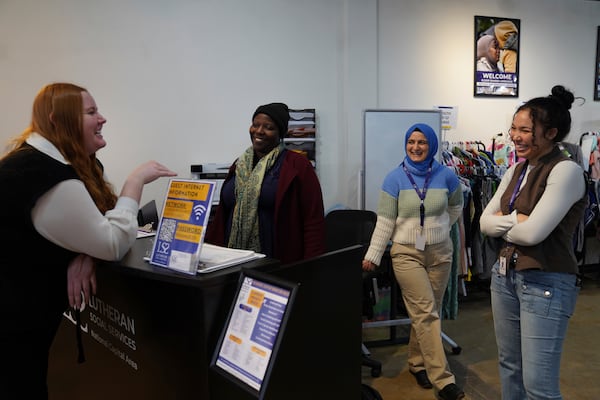 Employees of the Lutheran Social Services National Capital Area Resource Center in Alexandria, Va., Thursday, March 6, 2025. (AP Photo/Jessie Wardarski)