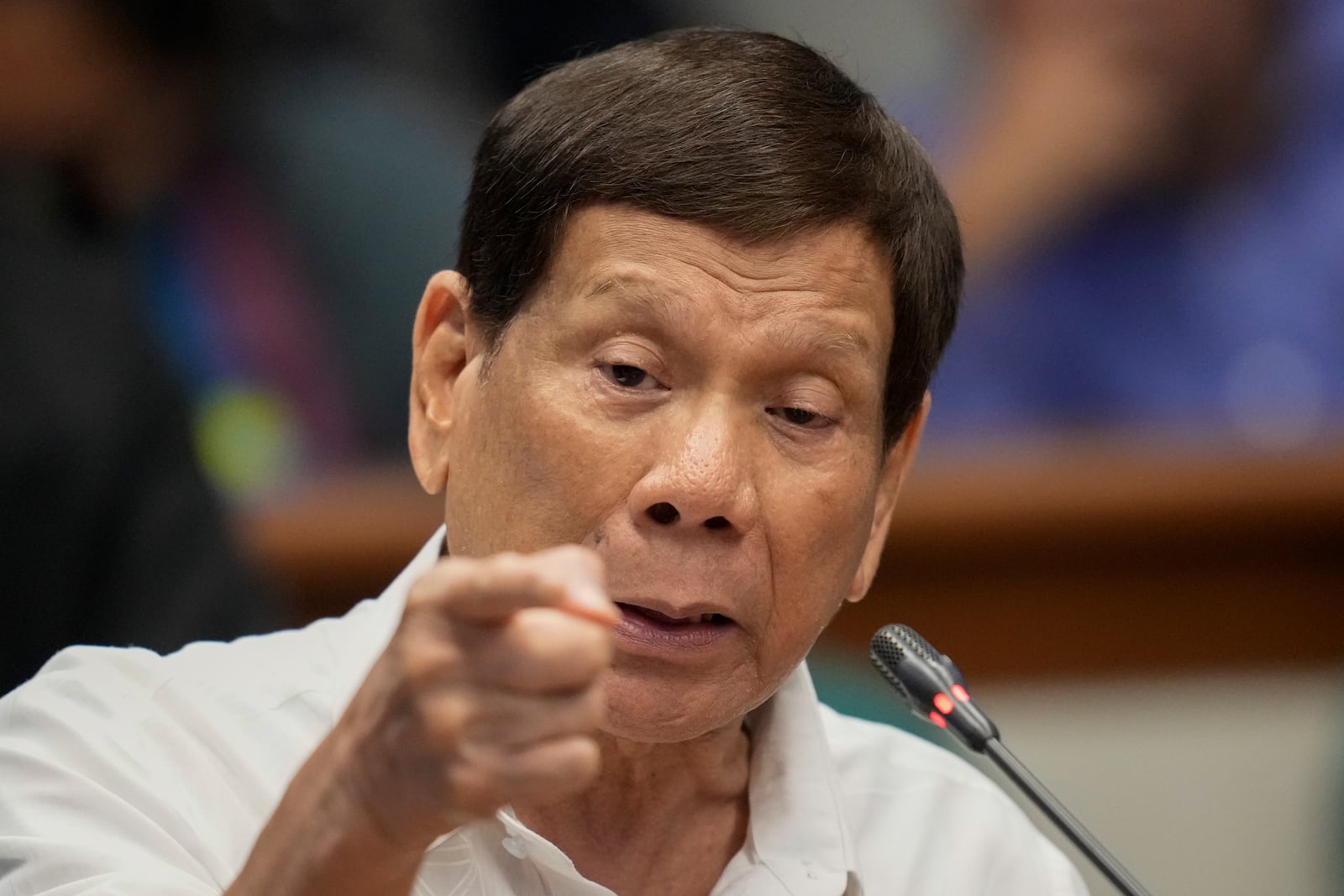 Former Philippine President Rodrigo Duterte speaks during a senate inquiry on the so-called war on drugs during his administration at the Philippine Senate Monday, Oct. 28, 2024, in Manila, Philippines. (AP Photo/Aaron Favila)