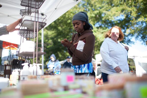 Smyrna resident Donna Gates tries out products at the 2013 Smyrna Fall Jonquil Festival.