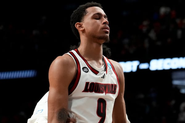 Louisville forward Khani Rooths (9) walks off the court after the first round of the NCAA college basketball tournament against Creighton, Thursday, March 20, 2025, in Lexington, Ky. (AP Photo/Brynn Anderson)